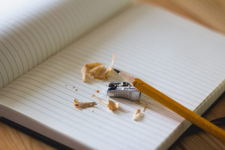 A pad of paper and a sharpened pencil