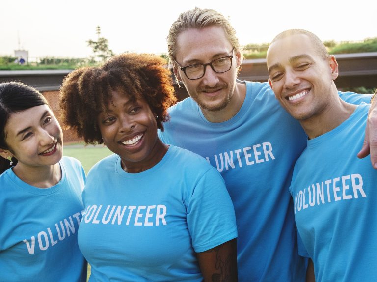 a multi-cultural group of volunteers
